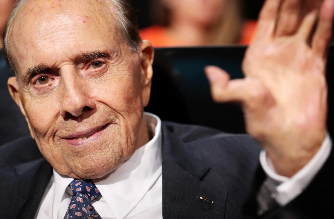 Trump threatens fire. Kansas remembers Bob Dole 