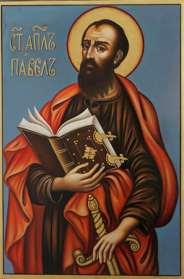 Orthodox Christian icon of Saint Paul the Apostle, painted in traditional Byzantine style with vivid colors. Paul is depicted with a dark beard and receding hairline, gazing upward with a solemn expression. He wears a red and dark brown robe, with a golden halo around his head. In his left hand, he holds an ornate, gold-decorated book, symbolizing his epistles, while his right hand rests on the hilt of a golden sword, representing the Word of God and his martyrdom. Greek lettering identifying him as Saint Paul appears to the left against a blue background.