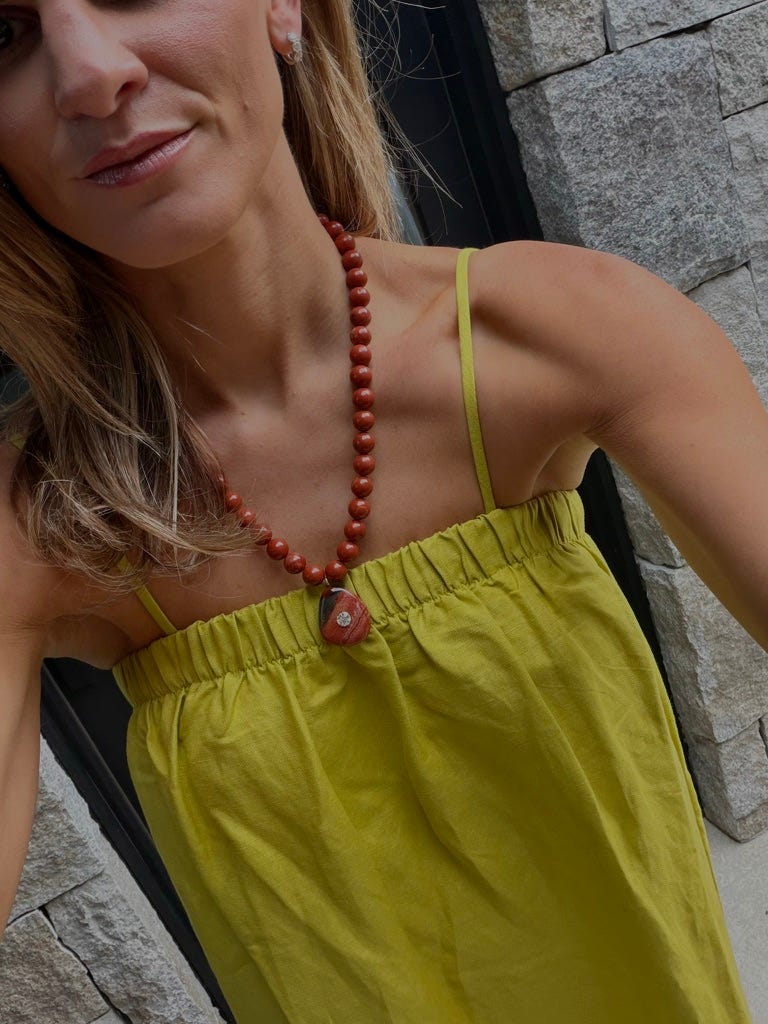 brighton butler wearing le bop dress and baublebar necklace