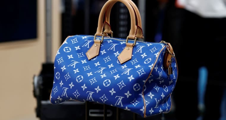 A Louis Vuitton bag is displayed at the LVMH Moet Hennessy Louis Vuitton stand during the Viva Technology conference dedicated to innovation and startups at Porte de Versailles exhibition center in Paris, France, June 12, 2025. REUTERS/Benoit Tessier