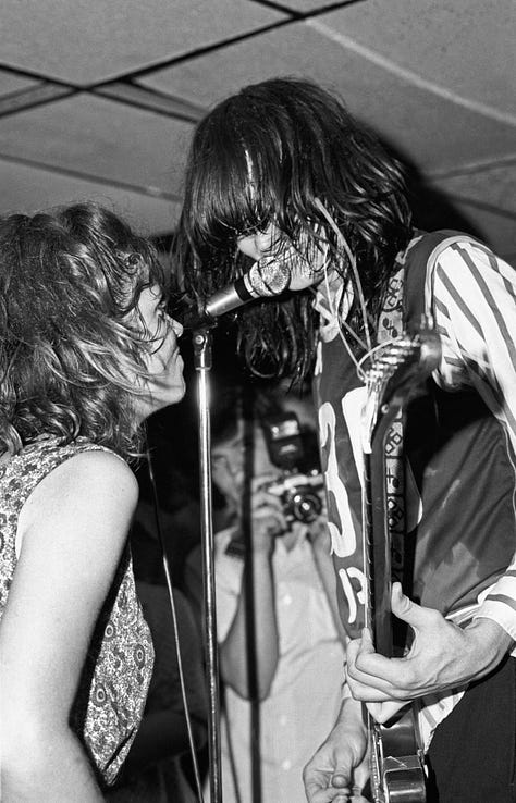 Gallery of 9 images of band Redd Kross, a rockband playing live in a small club called Cathay de Grande in Los Angeles.