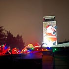 Up on the rooftop, reindeers pause, out jumps good ol' Santa Claus