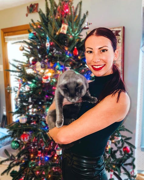 Three photos. One of Emily with hair up in a shirt that says "childfree cat lady." One of Emily and her cat, and another of Emily's cat, Celine.