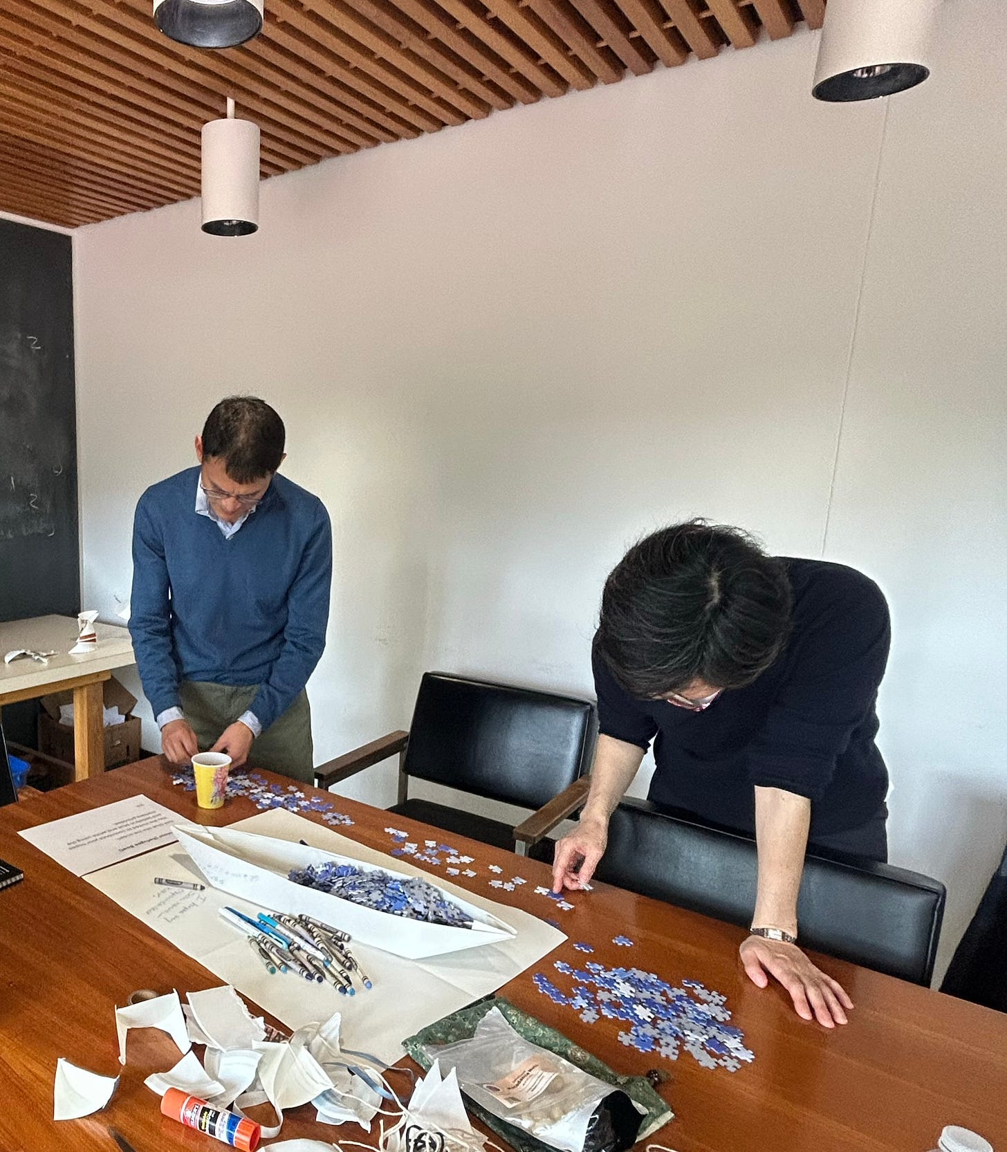 working on a puzzle together working on a puzzle together