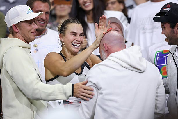 Aryna Sabalenka celebrates with her team after defeating Amanda Anisimova of the United States during their Women's Singles Final match on Day...