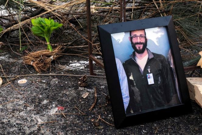 Photograph of Alex Pretti, 37, at an improvised memorial at the spot where he was shot dead by federal immigration agents earlier in the day in Minneapolis, Minnesota, on January 24, 2026.
