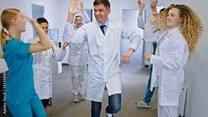 Smiling large group of nurses and ... Smiling large group of nurses and ...