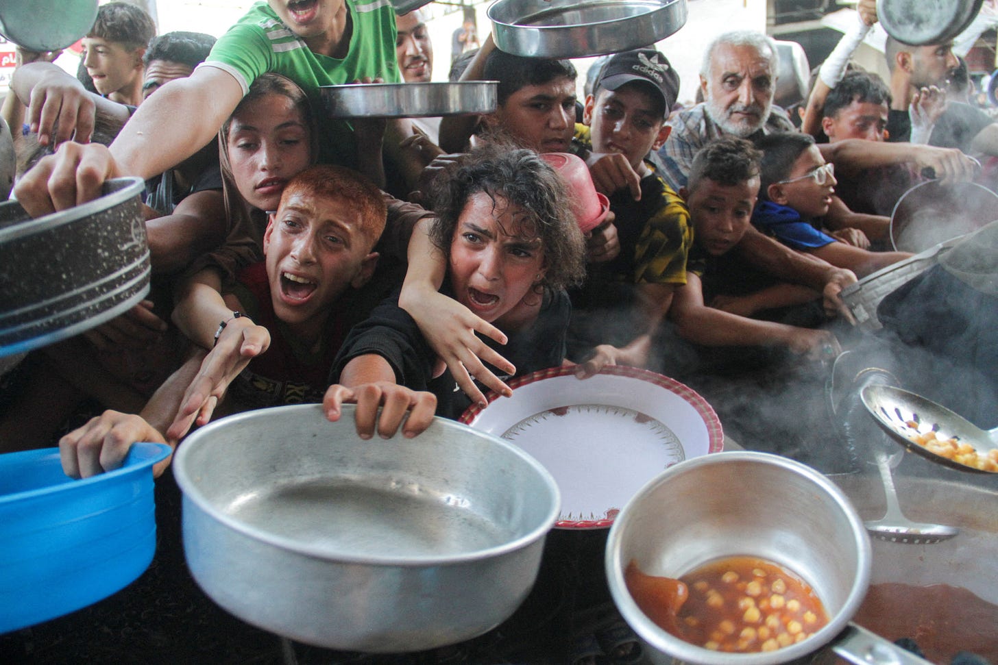 Food aid to Gaza falls as Israel sets new rule – sources | Reuters