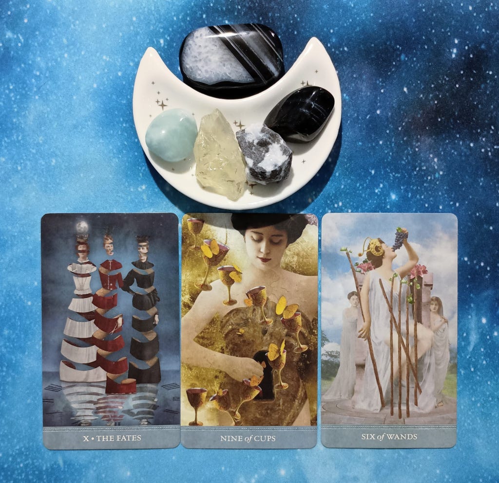 A Season of Expansion: A Message From the Universe, 3 Dreamkeeperâs Tarot cards and crystals on a starry blue background A Season of Expansion: A Message From the Universe, 3 Dreamkeeperâs Tarot cards and crystals on a starry blue background