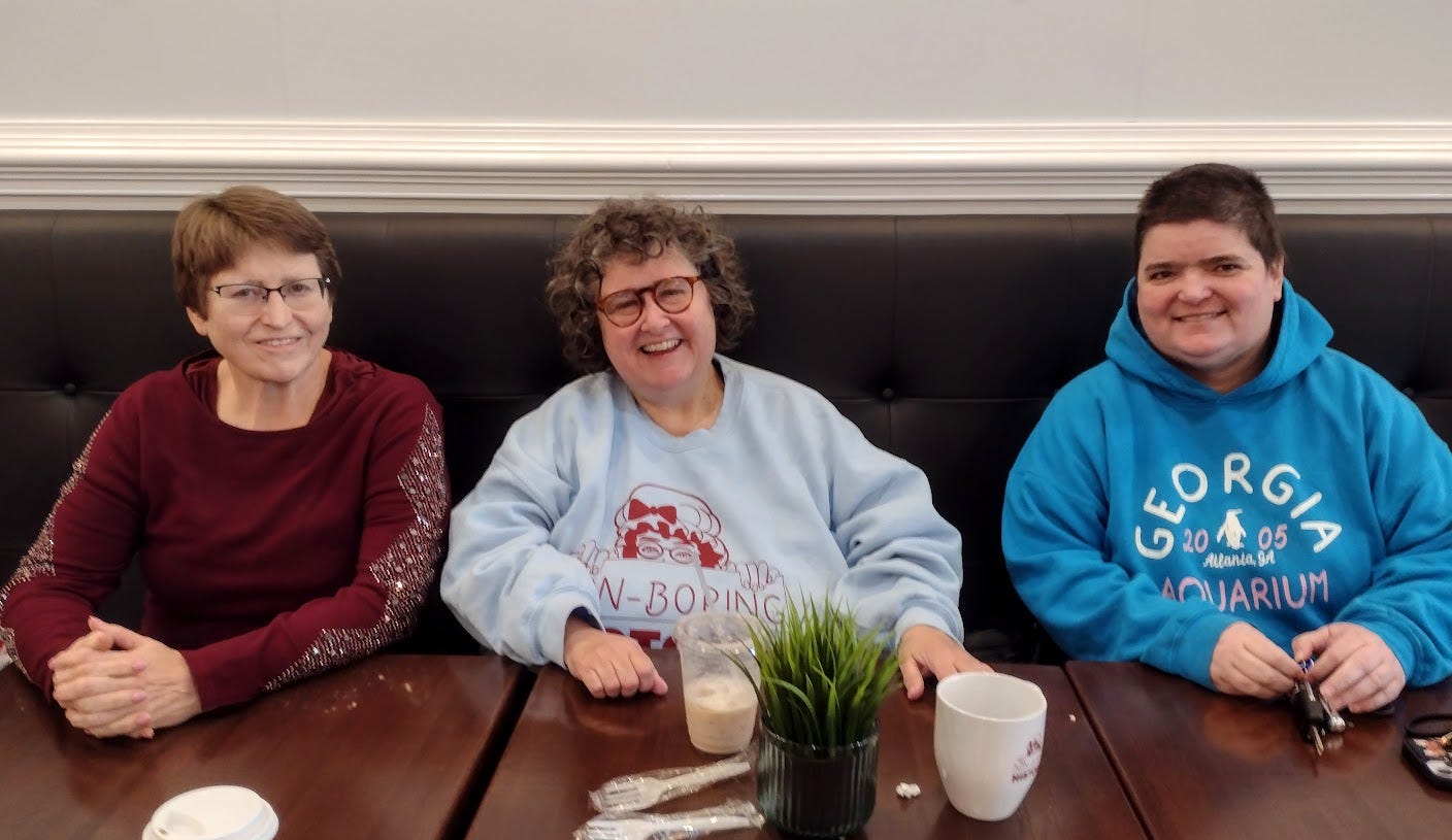 Three women in restaurant Three women in restaurant