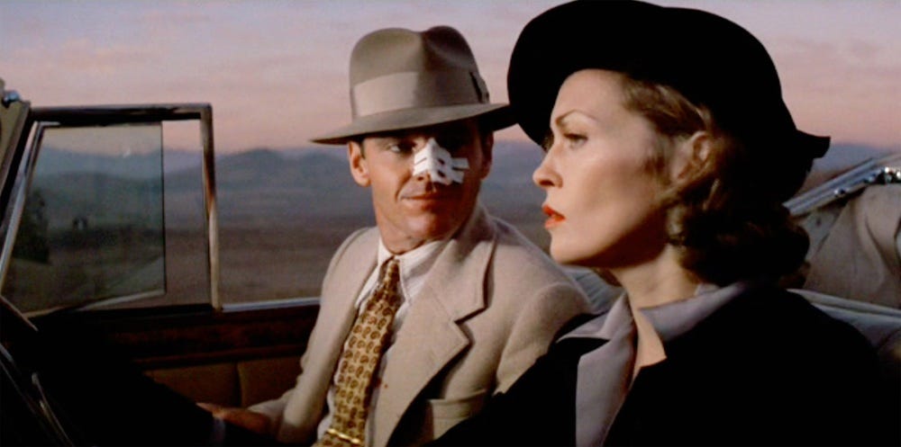 Jack Nicholson (with bandaged nose) and Faye Dunaway in "Chinatown" (1974)