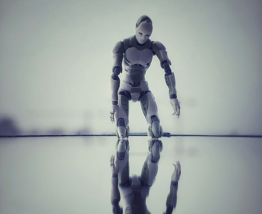 Do we need to recognize AI in art making as co-creditors? Photo by Piotr Bene on Unsplash 