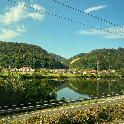 scenic photos of scenery through the train in Slovenia and Austria
