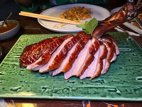 Xu decor plus the banana brûlée, Xu Cherry Wood Peking Duck and the pepper beef tenderloin.