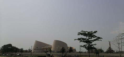 Pictures of the artwork on sale at the Marche des Arts de Cotonou, the Amazone statue, the Benin Congress building, and the second largest graffiti wall in the world