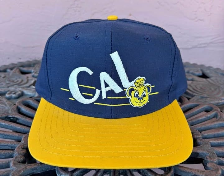 Product photo of Vintage Universal NCAA University Cal Golden Bears SnapBack Hat Product photo of Vintage Universal NCAA University Cal Golden Bears SnapBack Hat