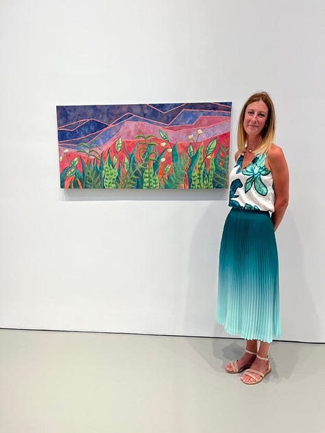 images of artists standing next to their artworks