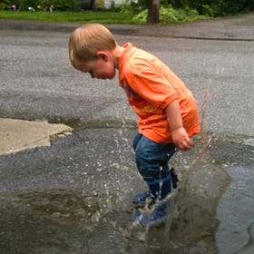 play in the puddles