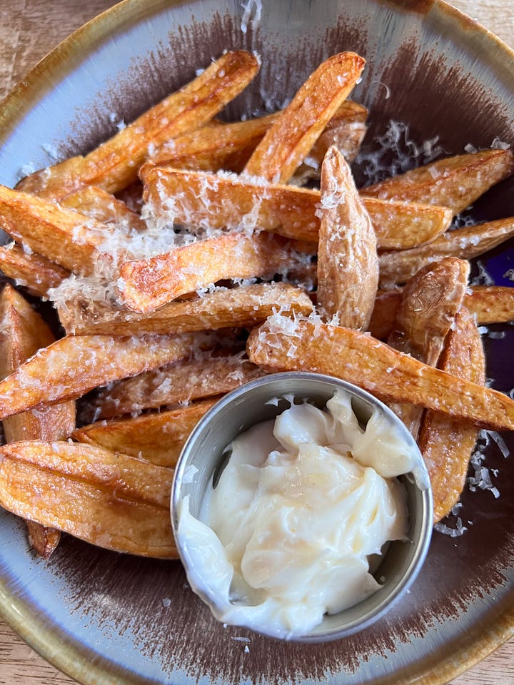 Watkins branch bourbon and brasserie truffle fries and buffalo wings