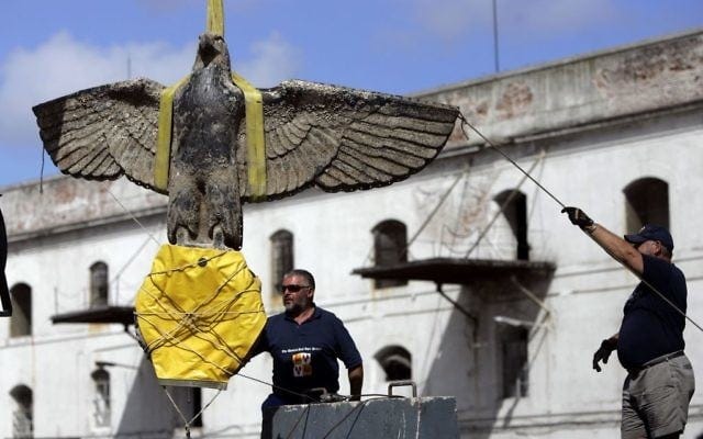 Uruguayan workers salvage the eagle of World War II German pocket battleship Admiral Graf Spee, in Montevideo, Uruguay, February 10, 2006. (AP/Marcelo Hernandez/File) Uruguayan workers salvage the eagle of World War II German pocket battleship Admiral Graf Spee, in Montevideo, Uruguay, February 10, 2006. (AP/Marcelo Hernandez/File)