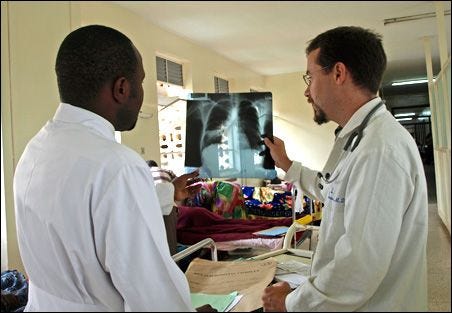 Dr. Michael Ssonko, left, and Dr. David Boulware Dr. Michael Ssonko, left, and Dr. David Boulware