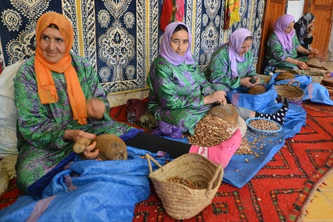 Scenes from Morocco featuring traditional architecture, vibrant souks, and cultural details - from geometric mosaic floors and colorful markets to local artisans and the famous goats in argan trees.