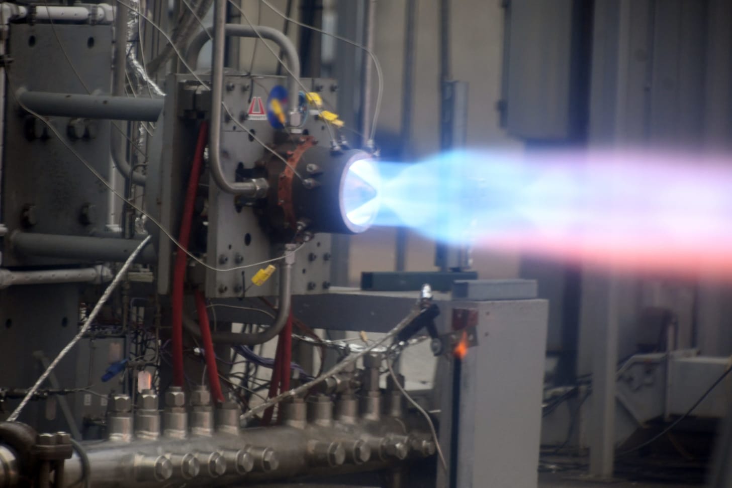 Astrobotic's Rotating Detonation Rocket Engine (RDRE) demonstrates a hot fire on a test stand.