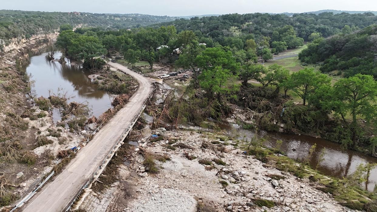 A drone view shows the Guadalupe River and damage from flooding near Camp Mystic in Hunt, Texas on July 5, 2025. A drone view shows the Guadalupe River and damage from flooding near Camp Mystic in Hunt, Texas on July 5, 2025.