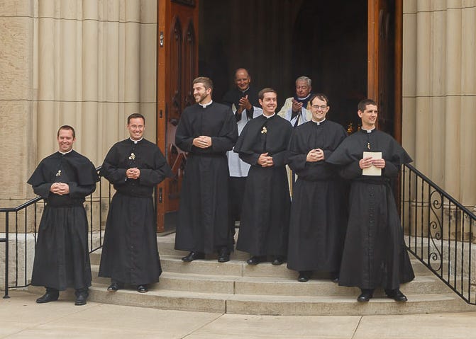 Half of newest class of Holy Cross priests made Phoenix pit stop during ...
