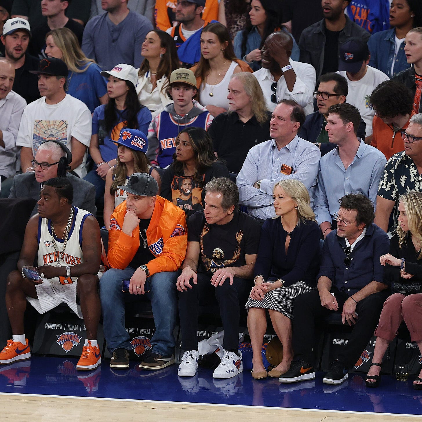 Celebrities including Tracy Morgan, Ben Stiller, Christine Taylor, Michael J. Fox and Tracy Pollan sit courtside during a basketball game. Celebrities including Tracy Morgan, Ben Stiller, Christine Taylor, Michael J. Fox and Tracy Pollan sit courtside during a basketball game.