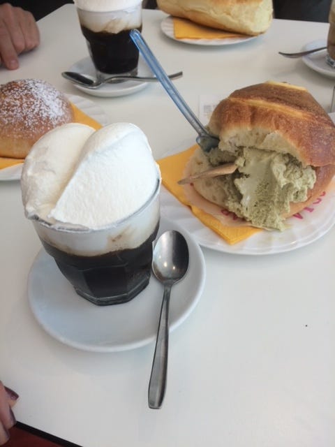 bounganvilla, coffee granita with panna colorful chair and stone buildings in Siciliy cannoli prickly pear cactus Sicily the blue sea