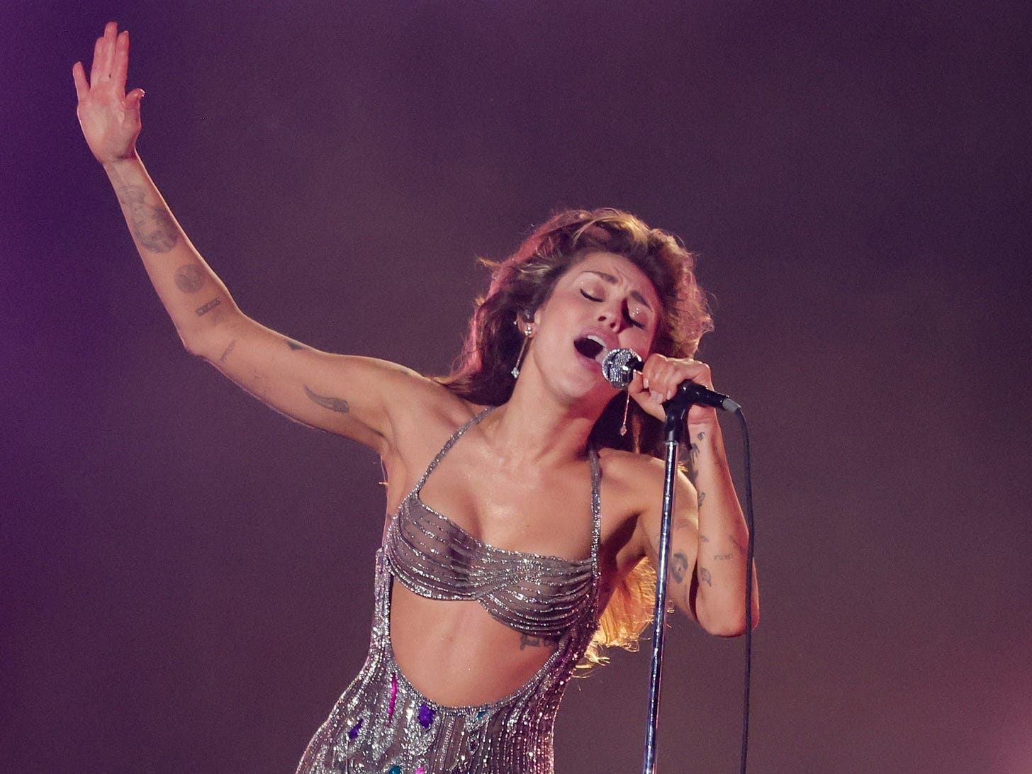 Miley Cyrus Wins First-Ever Grammy, Celebrates With “Flowers” Performance:  Watch | Pitchfork