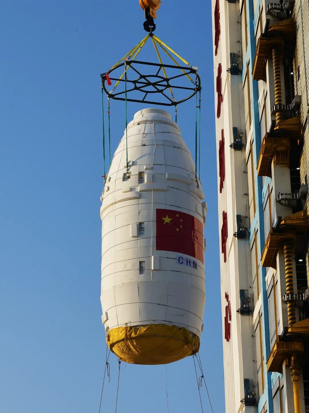 The Long March 4B’s fairing being lifted onto the launch vehicle with Ziyuan-3-04 inside.