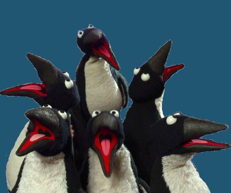 Group of Muppet Penguins singing. 