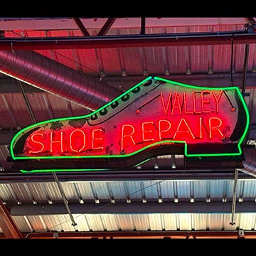 a host of signs from the Valley Relics Museum