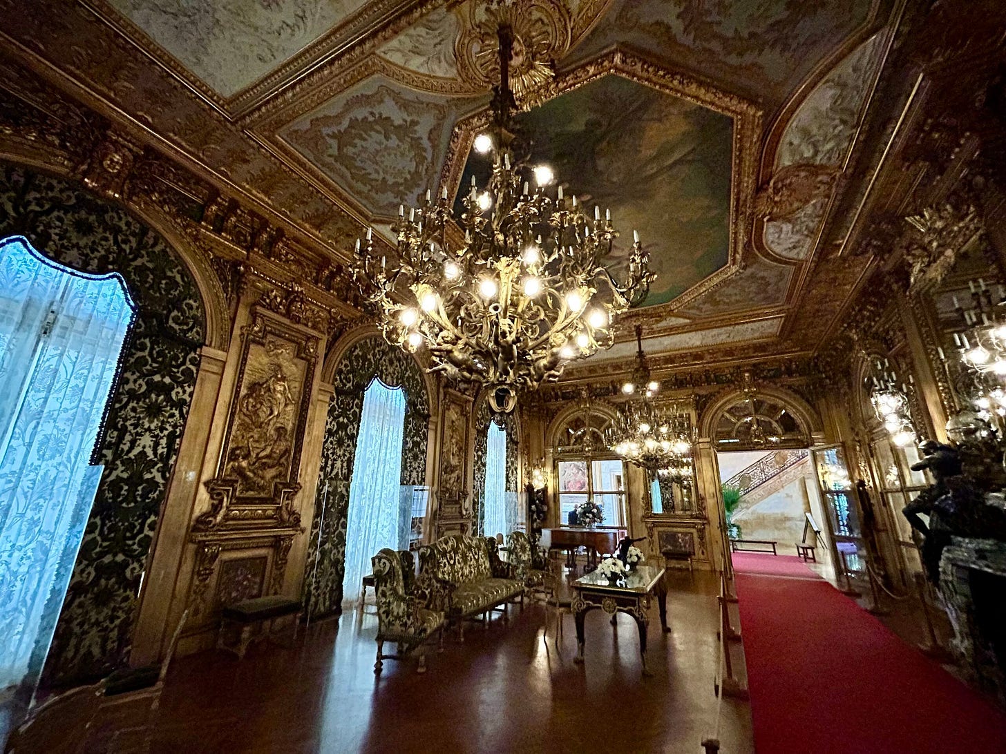 chandelier, chairs, tables, marble, mirror