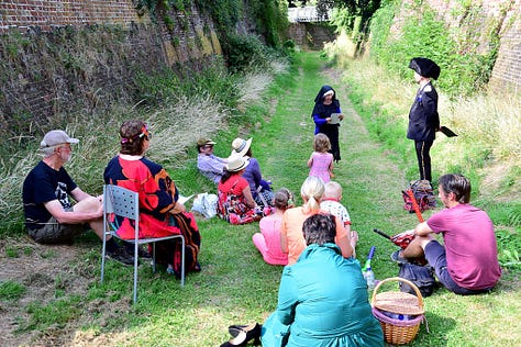 9 images from literary events in Medway. People reading from their books, people watching writers reading from their books. 