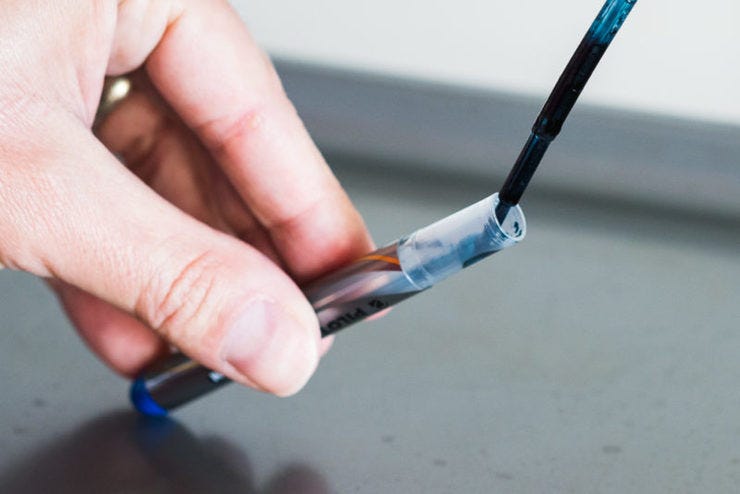 A no-longer-disposable Varsity fountain pen.
