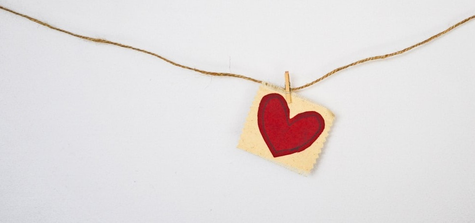 heart-shaped red and beige pendant