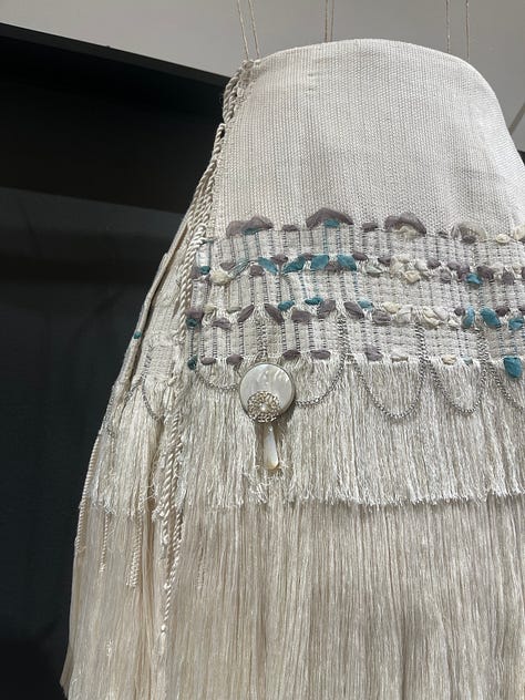 1-3. Dye Weave Pleat series of kilts with jewellery from Kristin Beeler.
