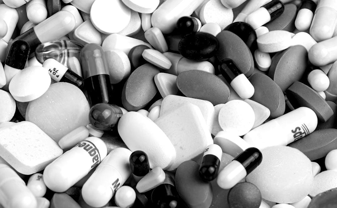 white blue and orange medication pill white blue and orange medication pill