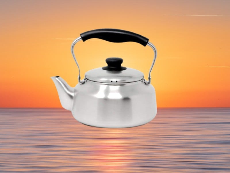 The Sori Yanagi kettle set against a romanic sunset