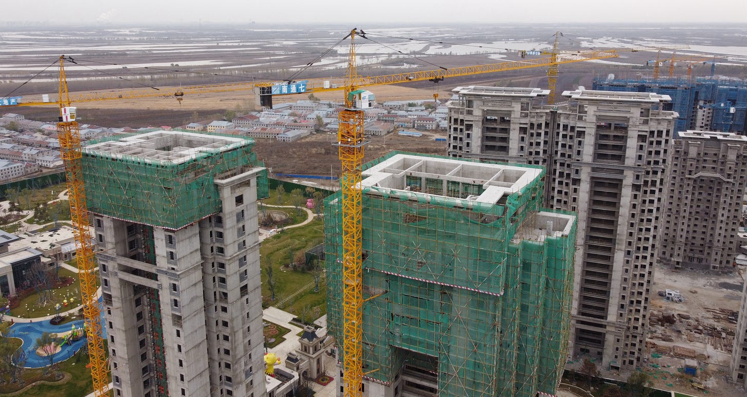 SUIHUA, CHINA - OCTOBER 18: Aerial view of a construction site of Evergrande cultural tourism city project on October 18, 2021 in Suihua, Heilongjiang Province of China. (Photo by VCG/VCG via Getty Images) SUIHUA, CHINA - OCTOBER 18: Aerial view of a construction site of Evergrande cultural tourism city project on October 18, 2021 in Suihua, Heilongjiang Province of China. (Photo by VCG/VCG via Getty Images)