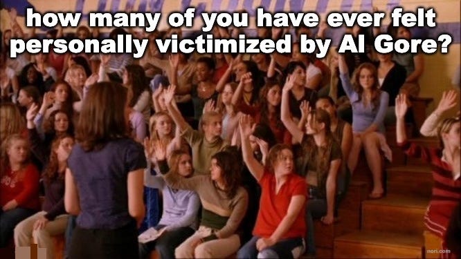 Mean Girls gym scene with a crowd of students raising their hands, captioned "How many of you have ever felt personally victimized by Al Gore?"