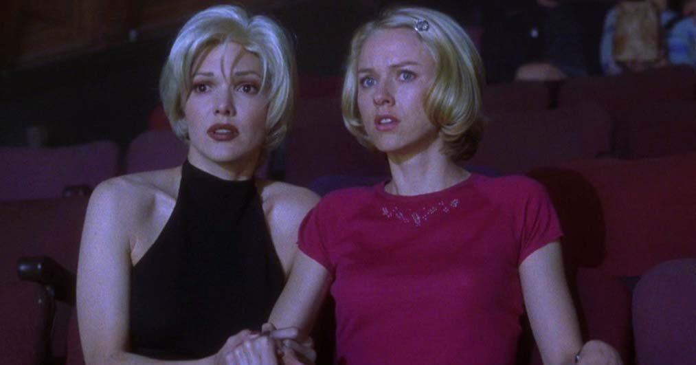 Naomi Watts and Laura Harring sitting in a movie theater.