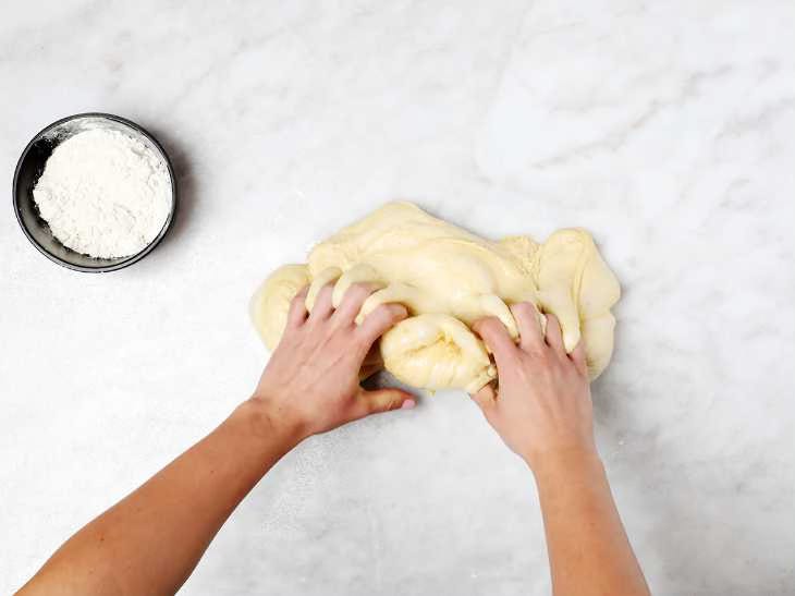 Pressing Down the Bread Dough
