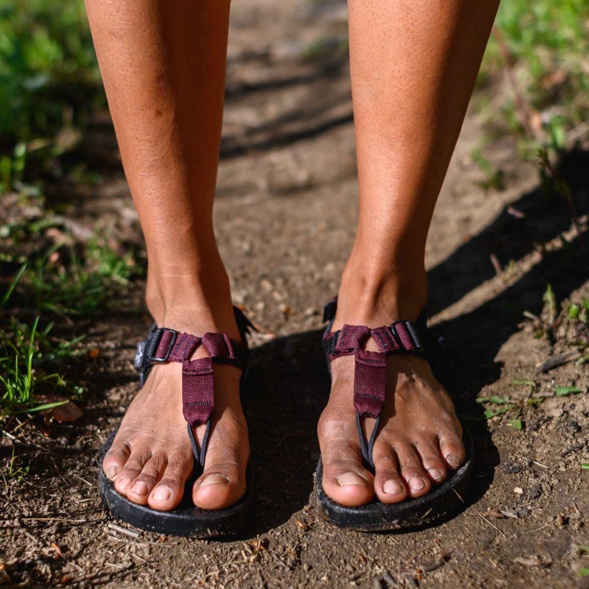 a man wearing bedrock cairn sandals a man wearing bedrock cairn sandals