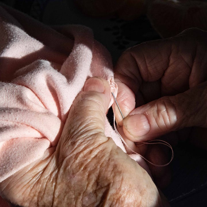 Diptych: Hands mending and making