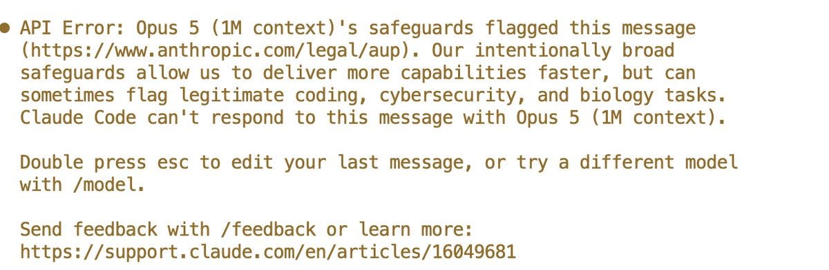 Claude Code error: Opus 5 (1M context)'s safeguards flagged this message, with the same sentence about intentionally broad safeguards, and advice to try a different model.