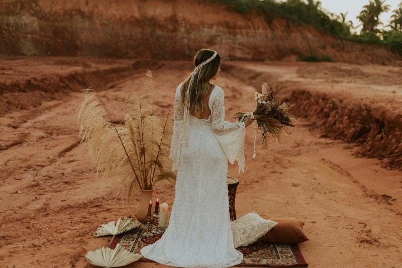 A person in a white dress

AI-generated content may be incorrect.